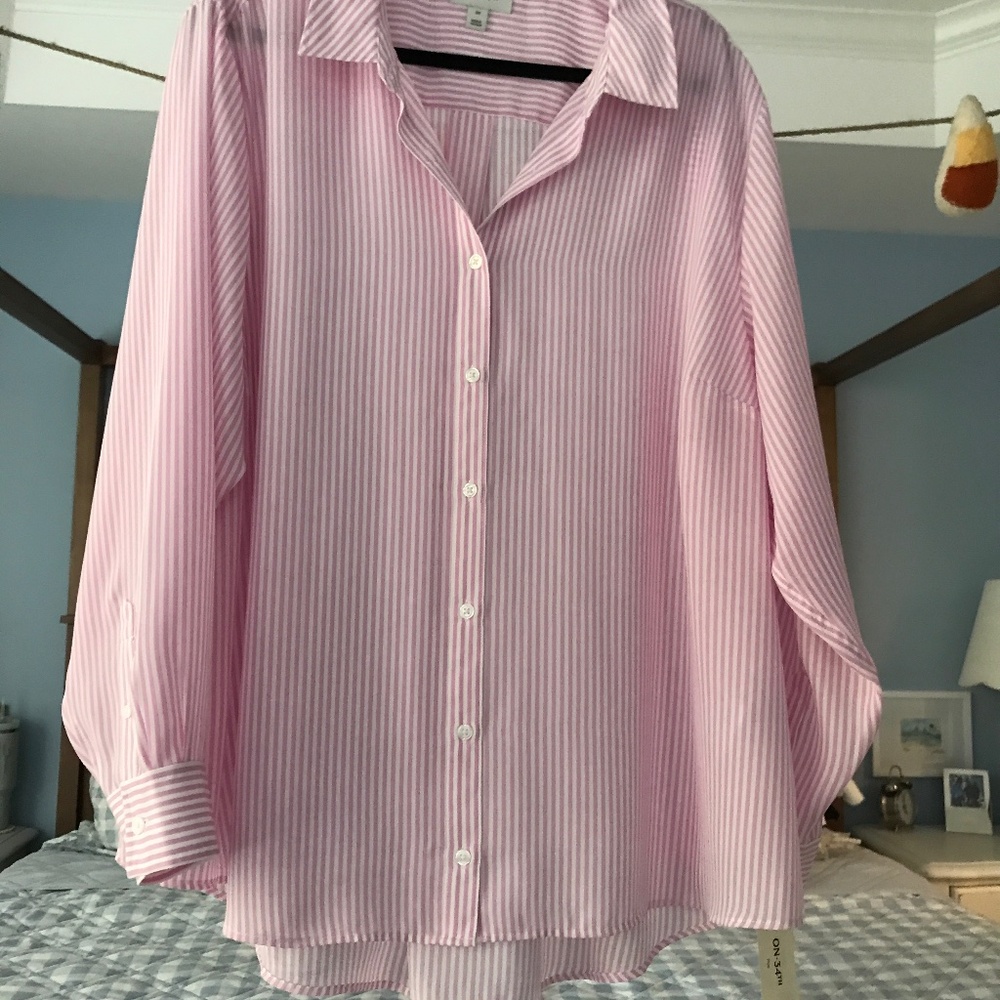 Pink and white striped polyester blouse. New with tags.